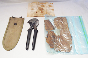 WWII US Marines Corps wire cutters with pouch, instructions, and the original wrapper the cutters came in
