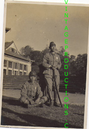 WWII Japanese Army NCO's, one holding sword, with squadron markings on uniforms Photo