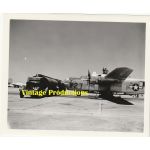 WWII era Photograph of a B-24 Photo-Reconnaissance Aircraft with tanker truck