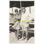 WWI era photo of pilots in front of an aircraft