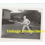1950's era photograph of a Marine with a Training Rifle