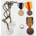 WWI era Dogtags and Medal Grouping. ​Lot contains German ring, 3 medals and dogtags