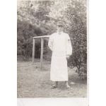 WWII Era Army Soldier Wearing Medical Robe Photo