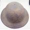 WWI M1917 helmet with what appears to be Camouflage