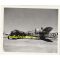 WWII era Photograph of a B-24 Photo-Reconnaissance Aircraft with tanker truck